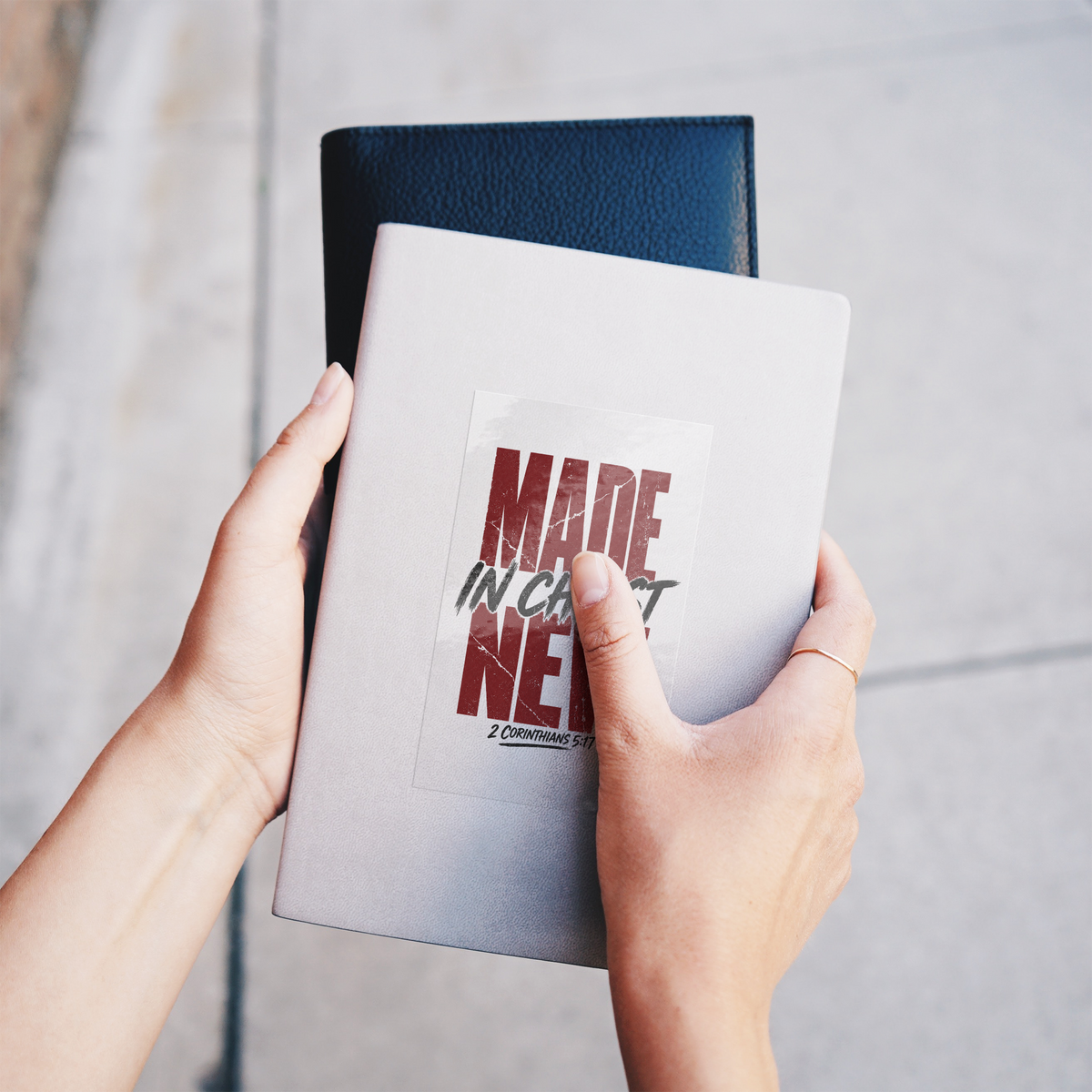 Made_In_Christ_New_Sticker__2_Corinthia_ClearRecSticker_Notebook_V_Mockup.png_16192583